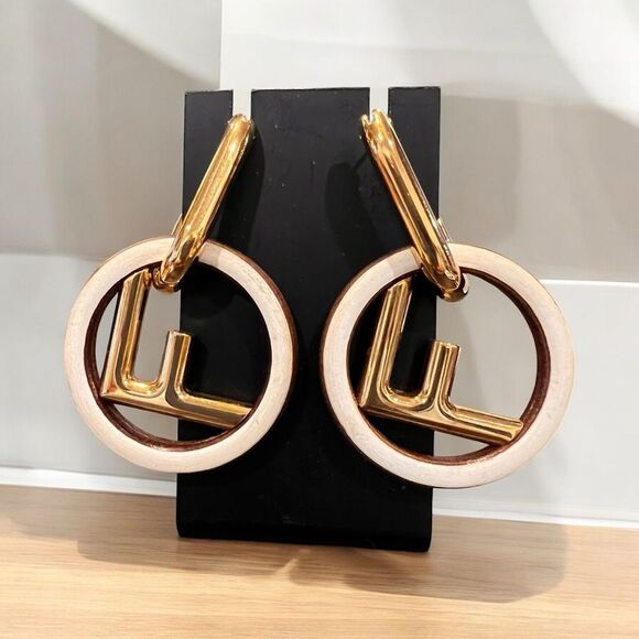 Fendi
Wood 'F is Fendi' Drop Hoop Earrings
Est. Retail Price of $1,190.00 - Picture 1 of 5